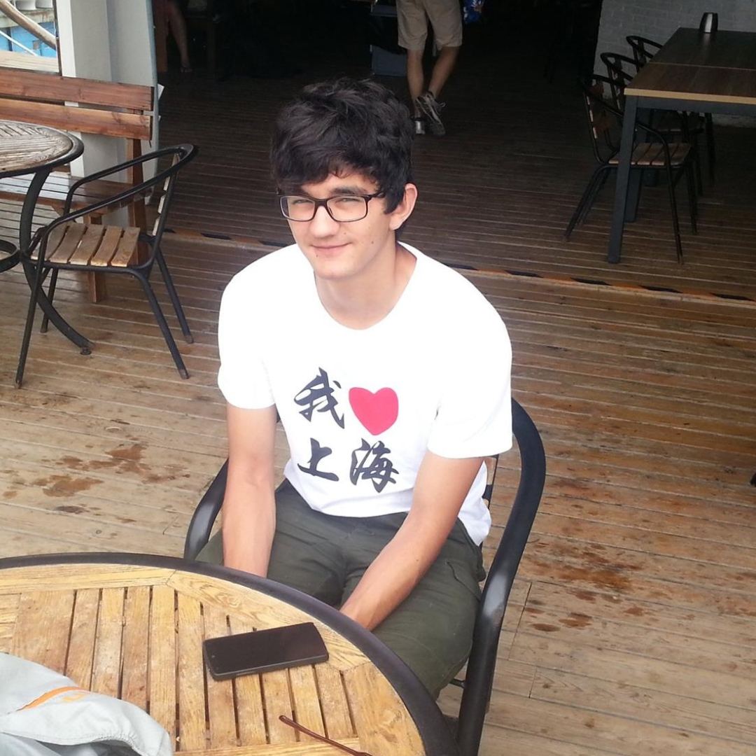 Fernando in Shanghai wearing an 'I love Shanghai' t-shirt