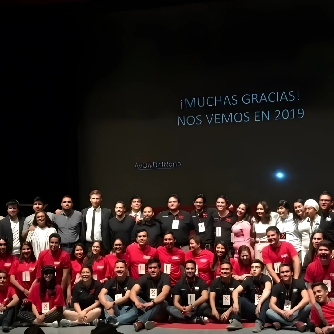 TEDx team group photo on stage